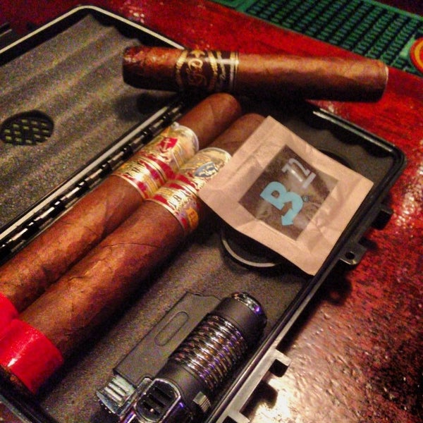 Photo taken at The Occidental Cigar Club by Travis H. on 11/6/2013