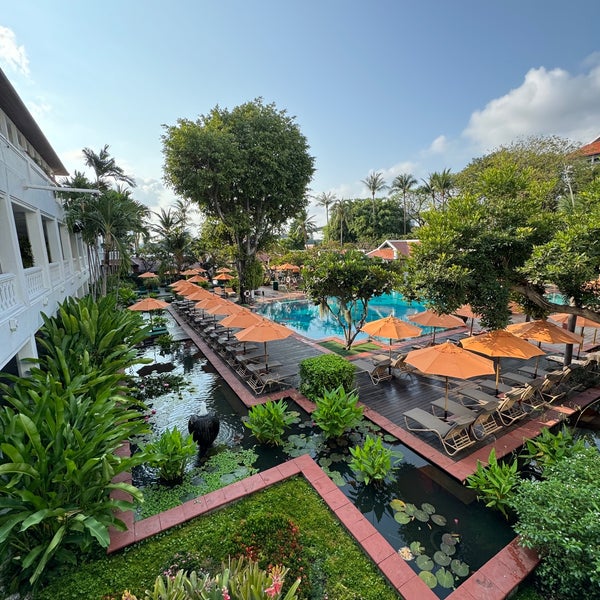 This is a beautiful Thai-style hotel in a great location. Stunning riverfront and pool area. Really good choice of restaurants. The rooms are good if not getting a little tired.