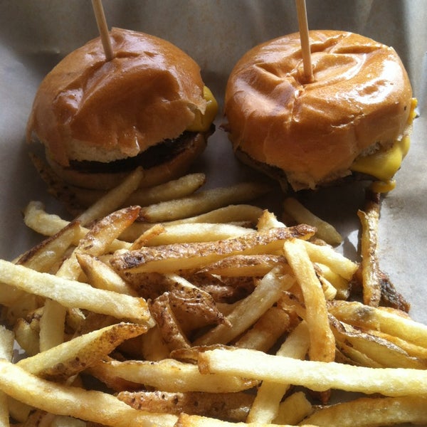 Photo taken at Juicy Burgers &amp; Dogs by Theo S. on 3/3/2013