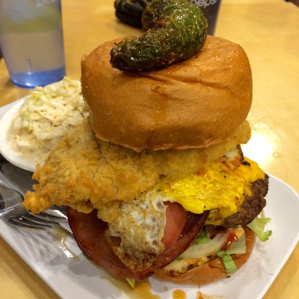 Photo taken at Crave Real Burgers by Theo S. on 2/14/2015