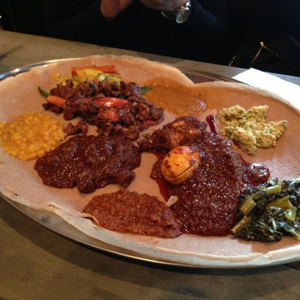 Photo taken at Bati Ethiopian Restaurant by Mido O. on 1/5/2013