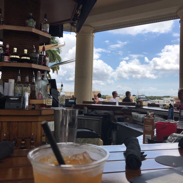 Photo taken at The Nauti Mermaid Dockside Bar &amp; Grill by Brian R. on 4/10/2019