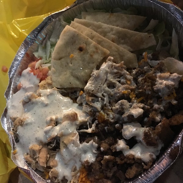 Photo taken at The Halal Guys by Annie N. on 9/1/2016