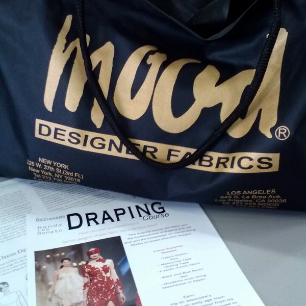 Photo taken at Mood Designer Fabrics by Rosanna W. on 8/27/2013