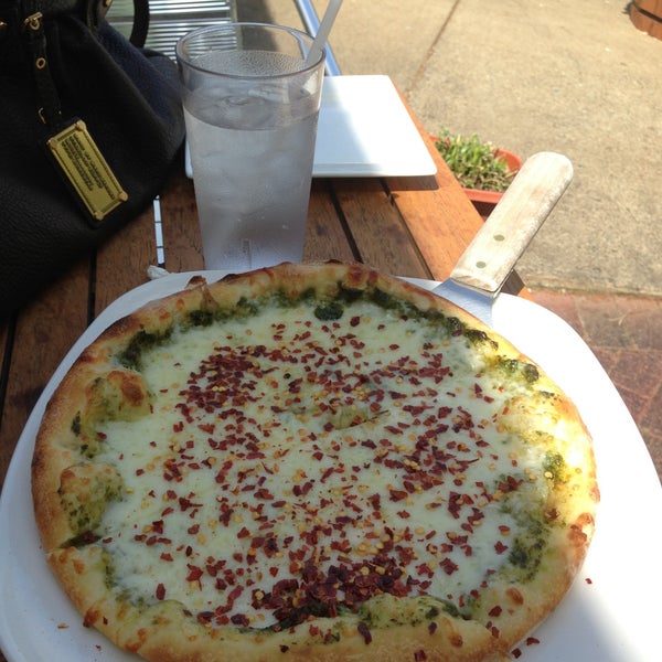 Photo taken at Del Ray Pizzeria by Veena S. on 4/17/2013