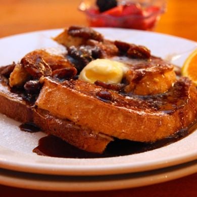 The bananas fosters French toast- take your basic french toast then top it with with thick cut bananas, pecans, & rich Spicebox whiskey sauce. Whiskey & sugar for breakfast? You bet your sweet tooth.