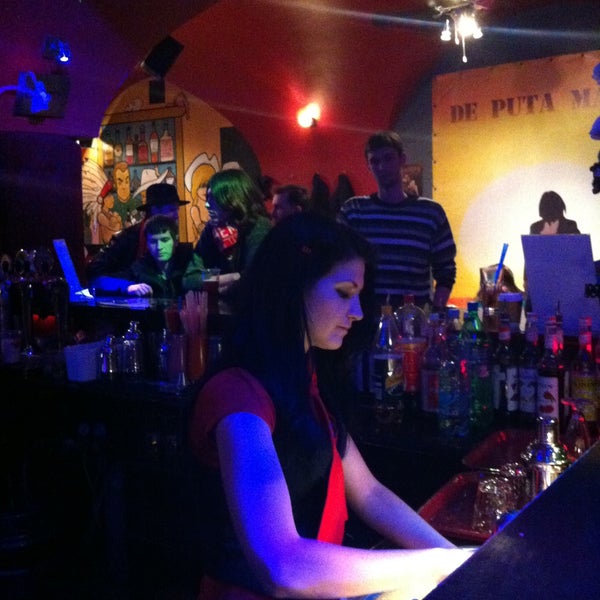 Photo taken at De Puta Madre bar &amp; cafe by Саша М. on 4/20/2013