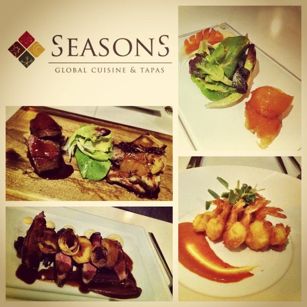 Photo taken at Seasons Global Cuisine &amp; Tapas by Dj P. on 12/19/2012