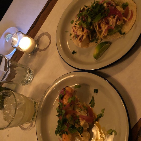 Try their marinated olives as a side dish with Octopus and potato salad from their appetizer list and fish tacos (grilled). Cool vibe, very chill spot for singles and couples.