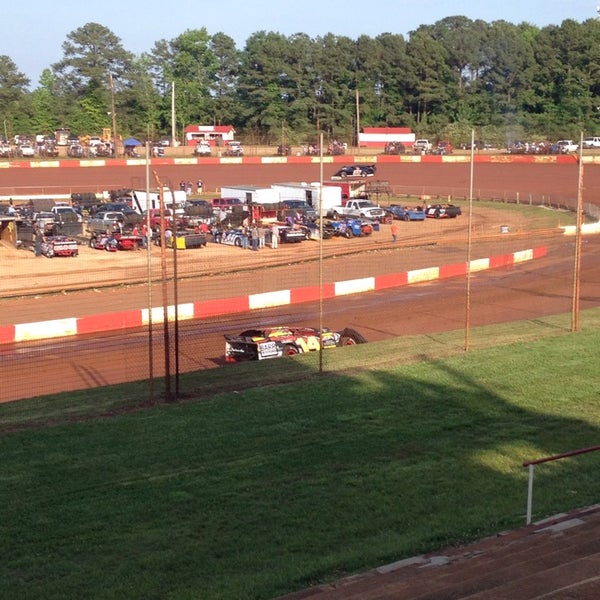 Photo taken at Dixie Speedway Home of the Champions by Emily C. on 5/17/2014