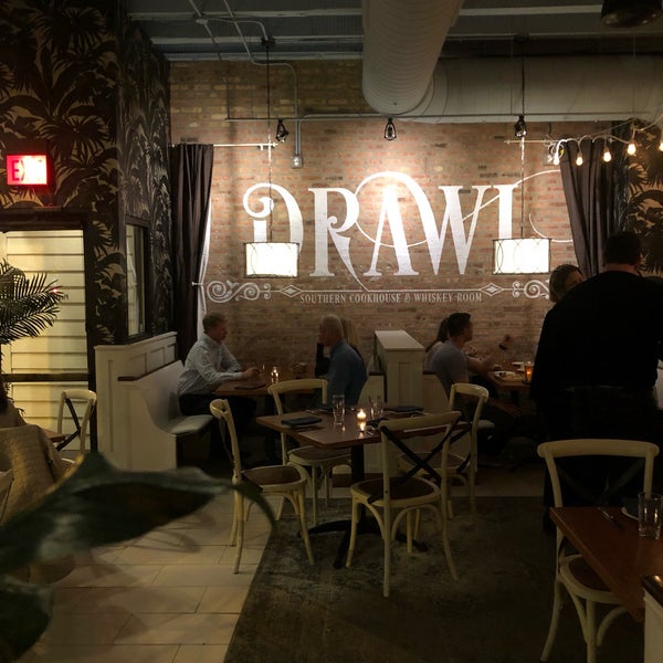 Photo taken at Drawl Southern Cookhouse And Whiskey Room by Vivian D. on 5/10/2019