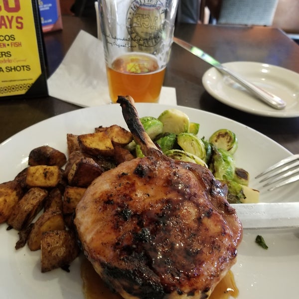 The beer and the HUGE grilled pork chop!!