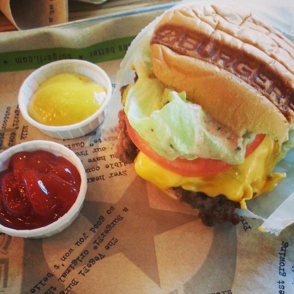 Photo taken at BurgerFi by Jed S. on 2/17/2014
