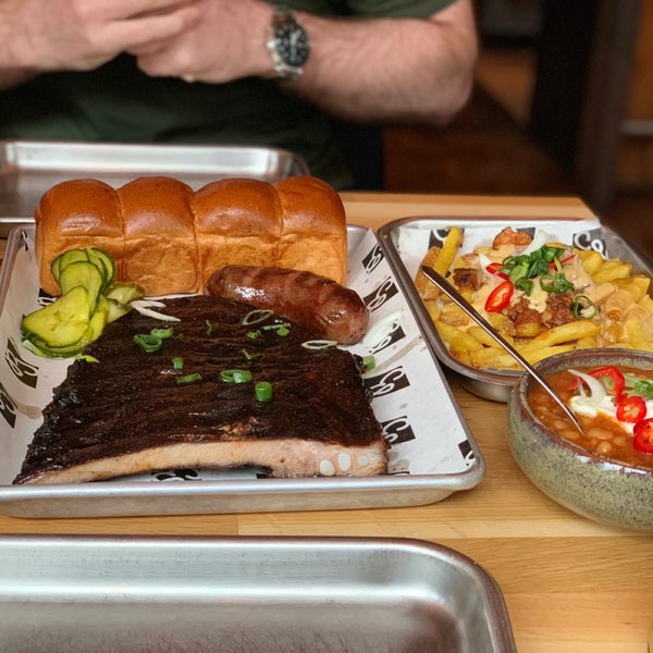 Photo taken at Brisket Southern BBQ &amp; Bar by Lisa S. on 5/11/2019