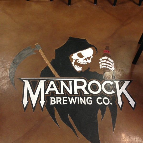 Photo taken at ManRock Brewing Company by Bryan R. on 12/22/2012