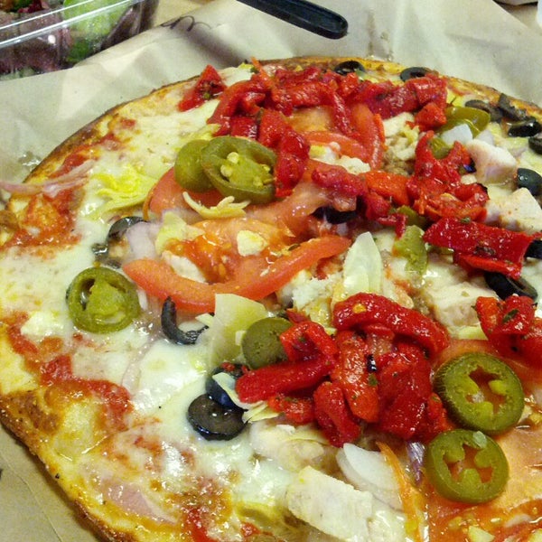 Photo taken at Pieology Pizzeria by Julian K. on 6/2/2013