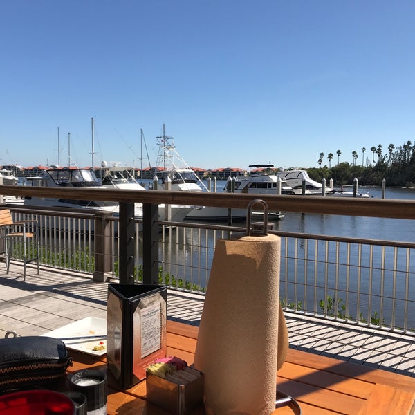 Photo taken at Outriggers Tiki Bar and Grille by Jarrod B. on 10/31/2017