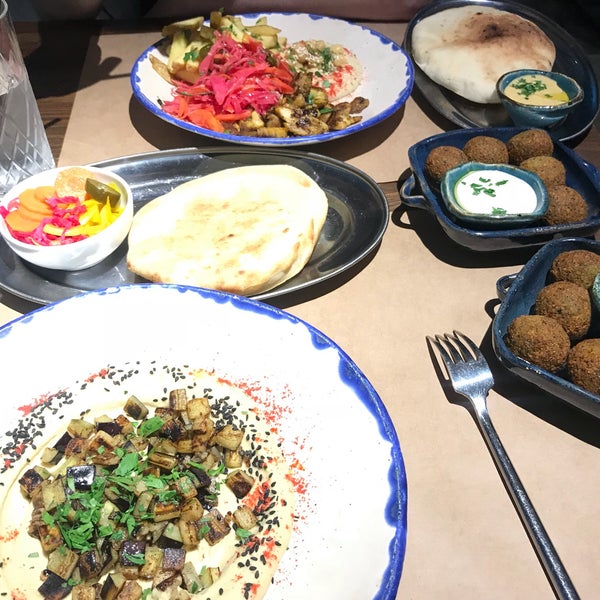 The best falafel I ever had. Pickled vegetables are tasty and hummus is a must. I ordered the hummus with eggplant 🍆 and it was amazing.