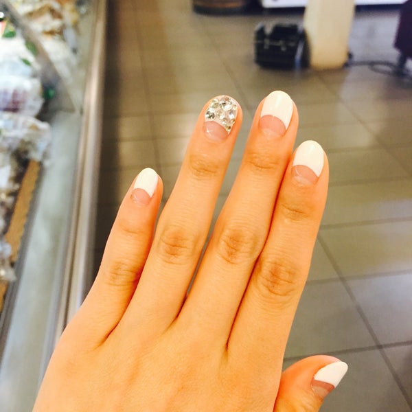 Photo taken at Fame Nails by Soojin P. on 2/7/2015