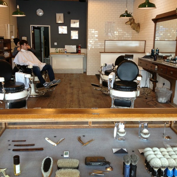 Photo taken at Baxter Finley Barber &amp; Shop by ᴡ H. on 12/23/2012