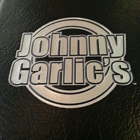 Photo taken at Johnny Garlic&#39;s by Rachelle on 12/31/2012