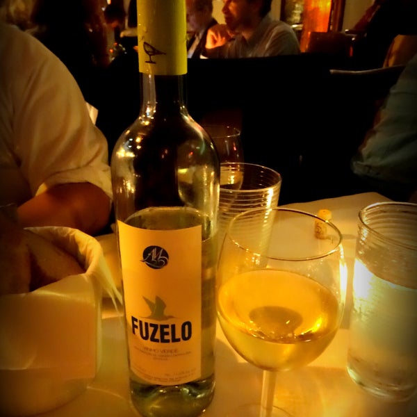 try the "green wine." it's actually a white wine made from young grapes. on the sweeter side.