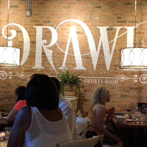 Photo taken at Drawl Southern Cookhouse And Whiskey Room by Megan B. on 7/14/2018