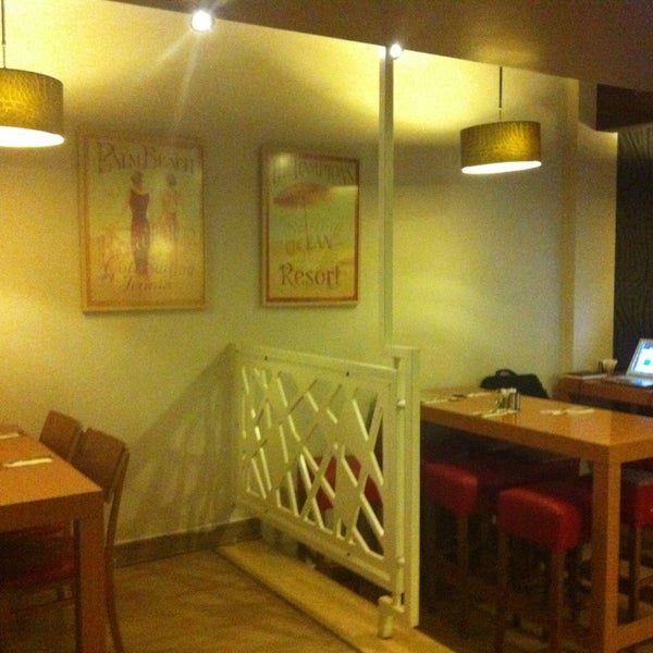 Photo taken at Time Café &amp; Restaurant by Ayşen S. on 1/6/2013
