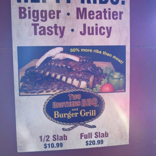 Photo taken at Two Brothers BBQ &amp; Burger Grill by Ali M. on 9/18/2012