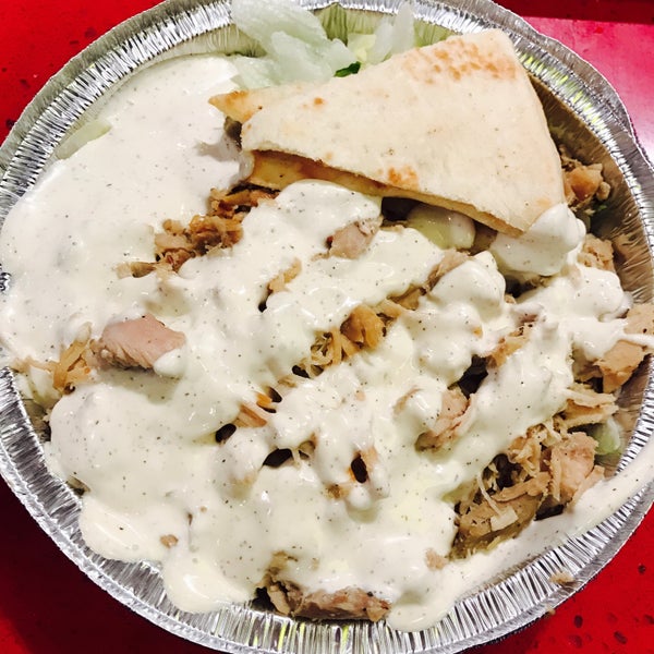 Photo taken at The Halal Guys by Amy L. on 10/13/2016