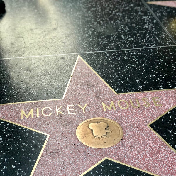 Photo taken at Hollywood Walk of Fame by Amy L. on 8/13/2018