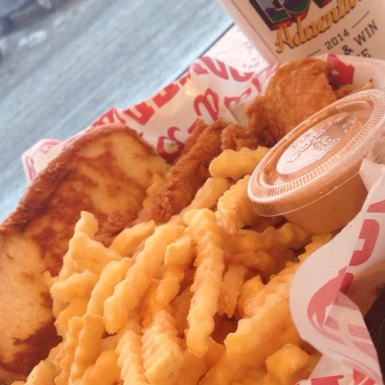 Photo taken at Raising Cane&#39;s Chicken Fingers by Rachel F. on 2/17/2014