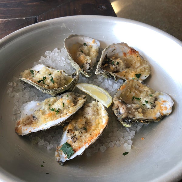 Photo taken at Reel Fish Coastal Kitchen + Bar by Annette M. on 8/11/2018