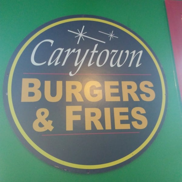 Photo taken at Carytown Burgers &amp; Fries by Andrea M. on 9/2/2018