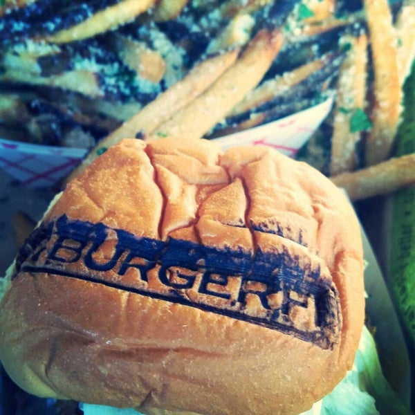 Photo taken at BurgerFi by shanna s. on 9/26/2014