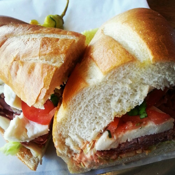 Photo taken at Capicola&#39;s Gourmet Sandwich Co. by Carmen B. on 1/18/2014