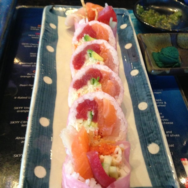 Photo taken at Blue Wasabi Sushi &amp; Martini Bar by Robin C. on 7/21/2013