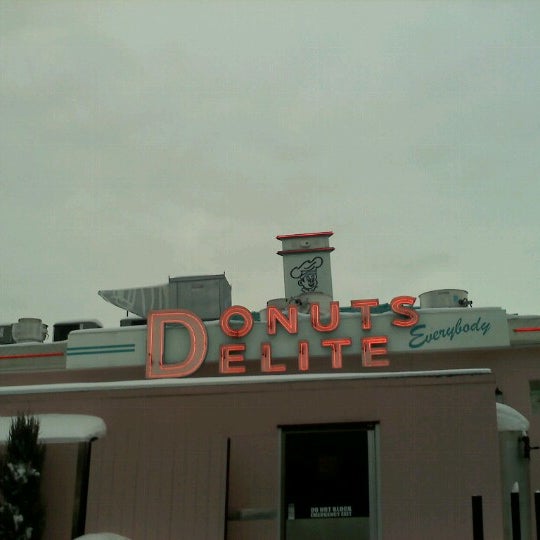 Photo taken at Donuts Delite / Salvatore&#39;s Old Fashioned Pizzeria by Debi B. on 12/31/2012
