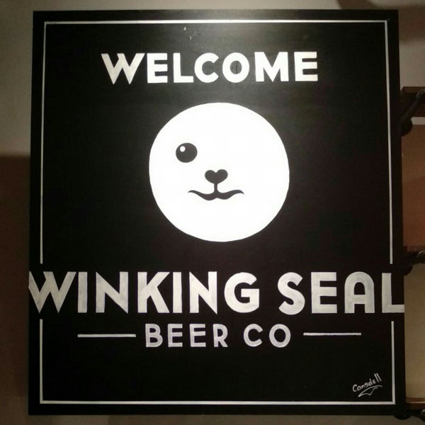 Photo taken at Winking Seal Beer Co. Taproom by Mark T. on 9/5/2018