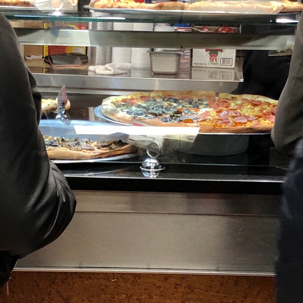 Photo taken at Georgio&#39;s Pizzeria by James M. on 2/27/2018