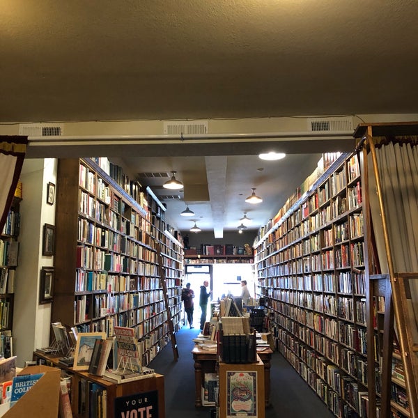 Photo taken at Owl &amp; Company Bookstore by Lizzie S. on 12/1/2018