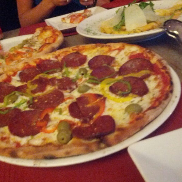 Photo taken at Pizza Pino Restaurant by Sonia M. on 7/4/2013