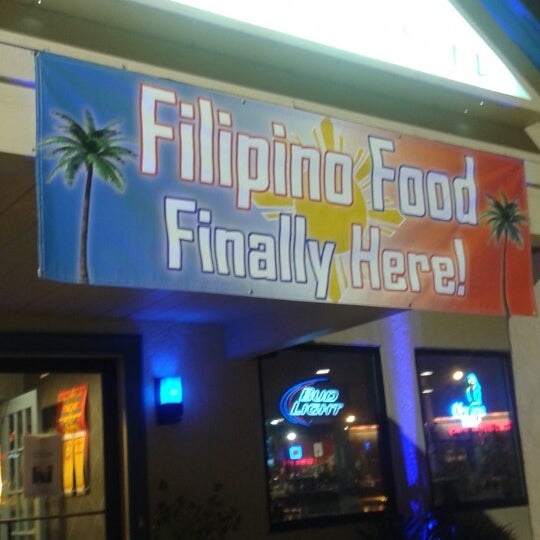 Photo taken at Filipino Fusion Bar &amp; Grill by Stephanie V. on 2/25/2015