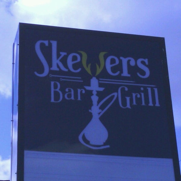 Photo taken at Skewers Bar &amp; Grill by Tom B. on 9/30/2013