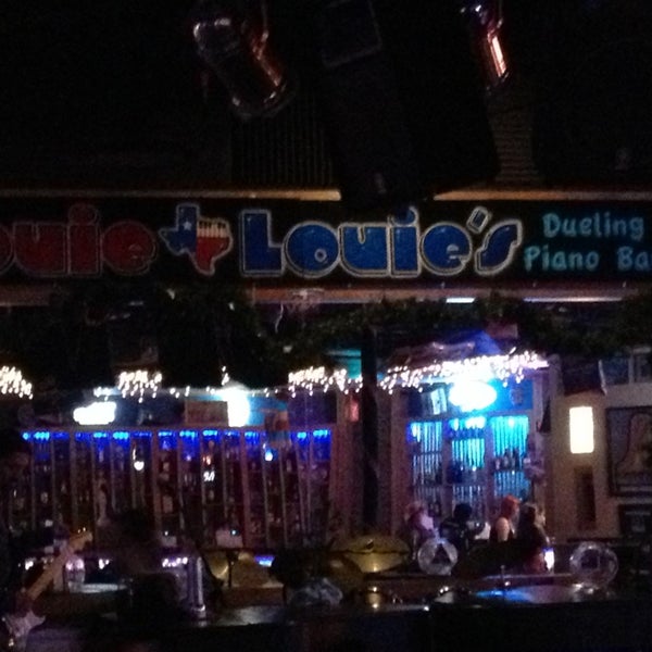 Photo taken at Louie Louie&#39;s Dueling Piano Bar by Austin D. on 12/30/2012
