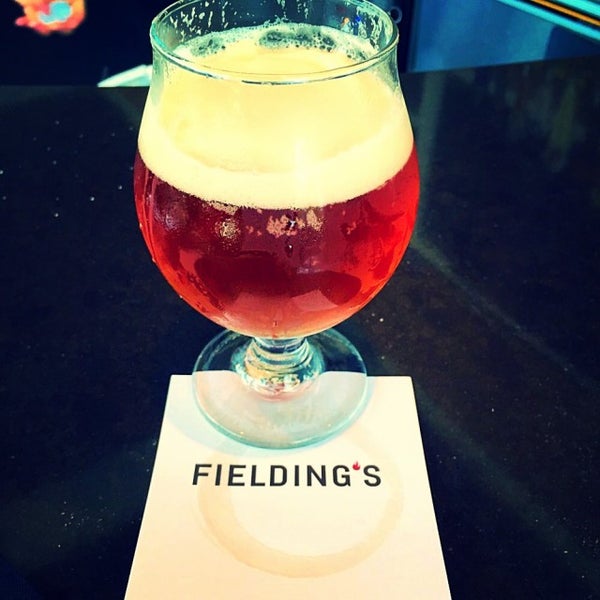 Photo taken at Fielding&#39;s local kitchen + bar by Crispin G. on 9/18/2015