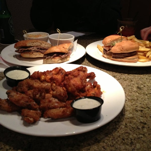 Photo taken at Wings Tap &amp; Grill by sonson411 on 1/6/2013