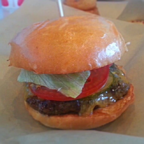 Photo taken at Juicy Burgers &amp; Dogs by Desiree R. on 5/20/2013