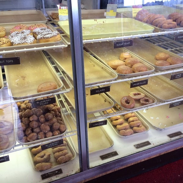 Photo taken at Ken&#39;s Donuts by Veronica D. on 3/16/2014