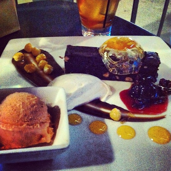 Photo taken at Crave Dessert Bar &amp; Lounge by Bridget F. on 7/20/2013